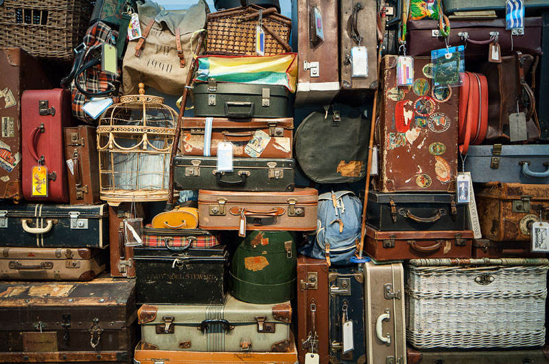 old suitcases stacked together