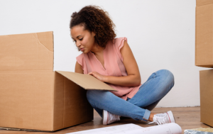 woman unpacking a box